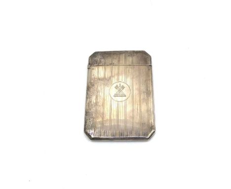 A George V silver Cigarette case, machine turned decoration, arrows engraved in the central escutcheon, Birmingham 1911, in a