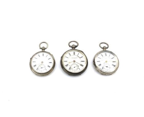 Three silver cased pocket watches, one swiss 0.935, the other two Chester 1892 &amp; 1897, all with machine turned decoration