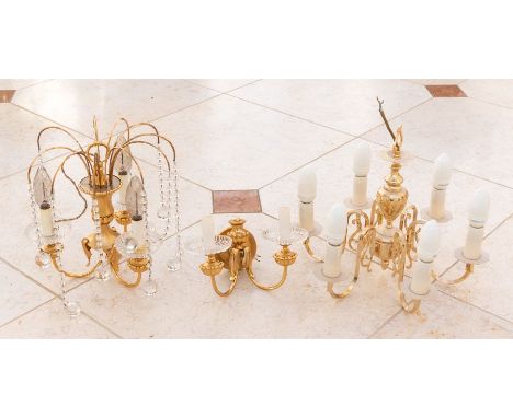 An early 20th century wall sconce, together with four further late 20th century gilt metal sconces and two chandeliers, and a