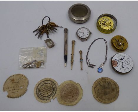 Mixed collection of pocket watch related items , to include some watch mechanisms , watch labels , watch keys , an silver wat