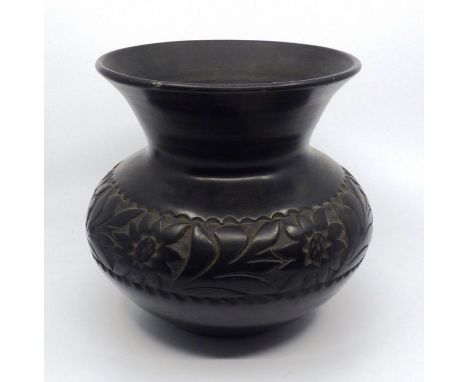 A ceramic vase with a band of flowers 18.5 cm high Minor flakes to top edge