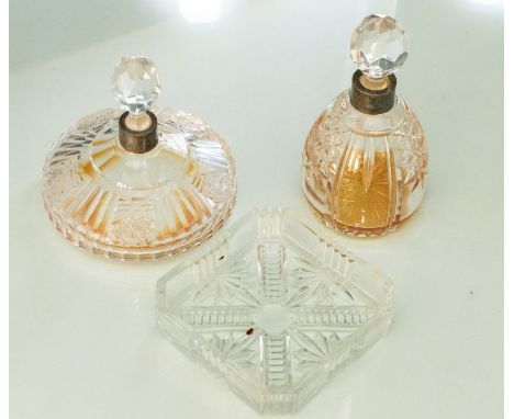 Two silver collared cut glass perfume bottles together with a cut glass rectangular tray (3)Please note this item is at an of