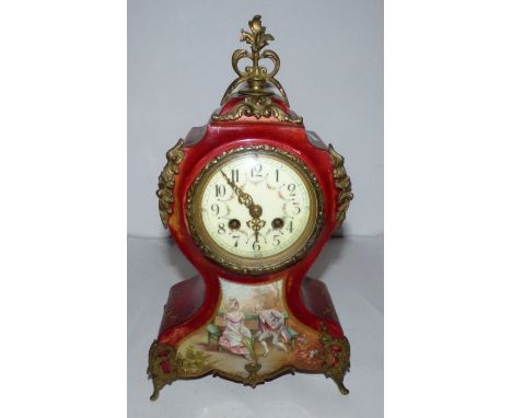 A Victorian French ceramic clock with gilt metal mounts , 37 cm high