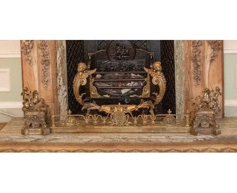 An ornate 19th century brass fire surround, prominently featuring two cherubs on prancing horses 189cm W x 40cm DPlease note 