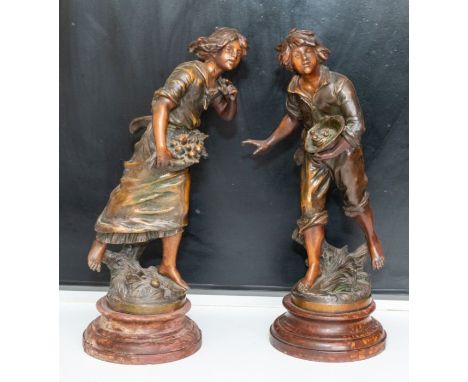 Two spelter figures, male and female, on wooden bases, 45cm high (2)Please note this item is at an offsite location, buyers w