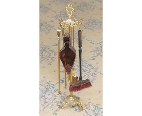 A mid to late 20th century gilt metal fireplace companion setPlease note this item is at an offsite location, buyers will be 