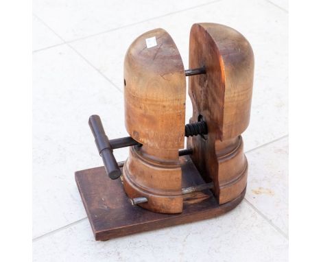 An early 20th century mahogany hat stretcher, on a rectangular basePlease note this item is at an offsite location, buyers wi