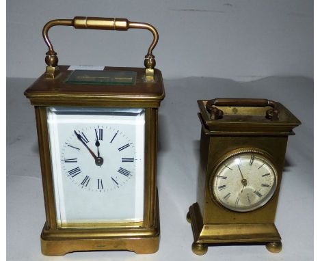 An antique brass carriage clock and another clock in a brass frame , 16.5 cm and 12.5 cm high (2)