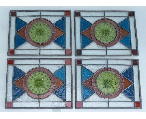 Four art deco style lead lined coloured glass panels 23cm x 18cm each (4)Please note this item is at an offsite location, buy