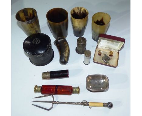 Collection of horn beakers , largest has a hallmarked silver band , 10.5 cm high . a horn snuff box , a wireless savings bank