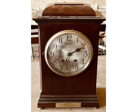 A 20th century mahogany mantle clock; with another similar wall clock (2) (AF)