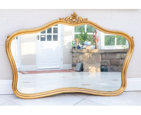 A large and impressive mid to late 19th century gilt wood mirror, mounted with foliate decoration.100cm x 148cm Please note t