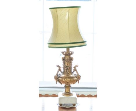 A pair of mid 20th century bedside lights, globular ornate columns with swag decoration, on white square marble bases, all ra