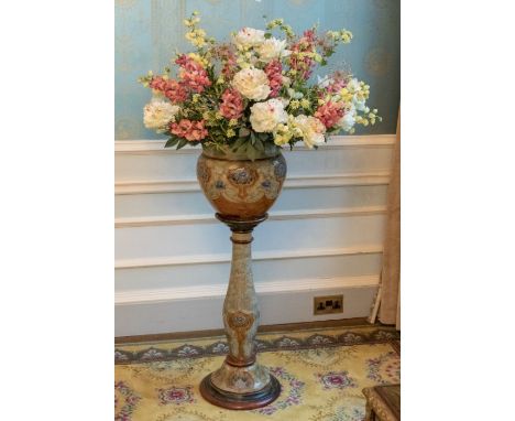 A Royal Doulton stoneware Jardiniere, makers marks stamped to the underside of the base 107cm HPlease note this item is at an