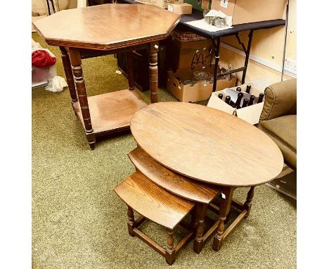 An early 20th century mahogany octagonal table, on a square frame, raised on turned supports united by a shelf on short taper