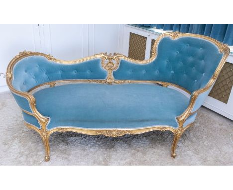 A late Victorian chaise lounge, giltwood with blue upholstery, in rococo style, 79cm H x 130cm W x 59cm DPlease note this ite