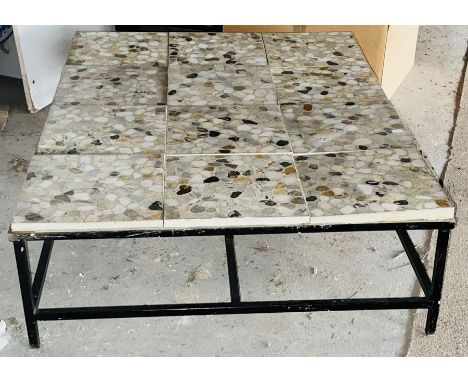 A 20th century tile on metal coffee table. 31cm H x 124cm W x 93cm D