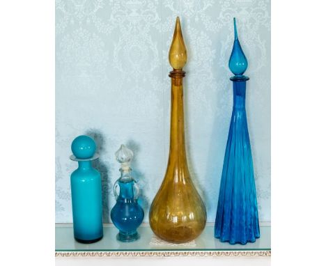 Two large coloured glass jars, together with two other coloured glass examples (4)Please note this item is at an offsite loca