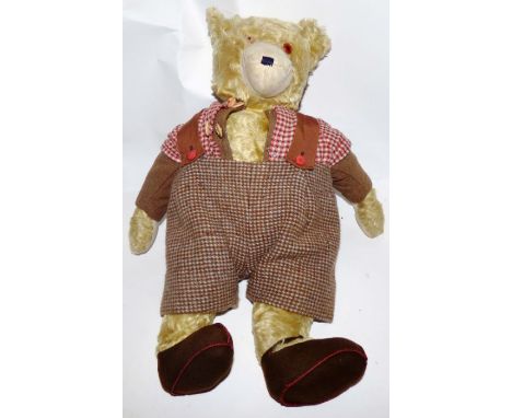 Possibly a Steiff bear , dressed in homemade clothes 54 cm high missing the Steiff seal on the ear , there is a hole where th