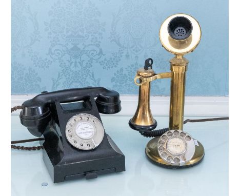 An early 20th century brass telephone, together with a mid 20th century bakelite example (2)Please note this item is at an of