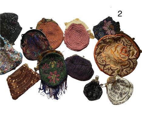 A collection of antique and vintage bags, mostly early 20th Century there is a large Arts &amp; Crafts style embroidered bag 