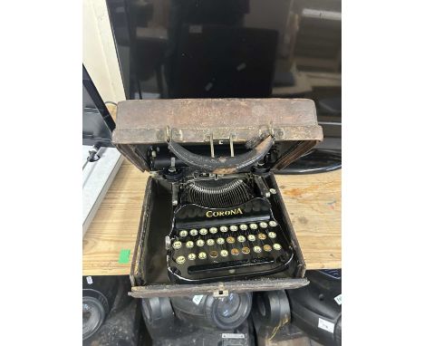 Vintage Corona portable typewriter in leather case