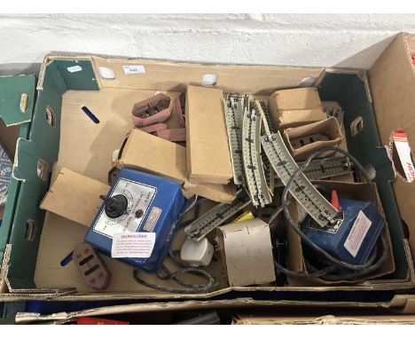 Box of various model railway track, power unit etc