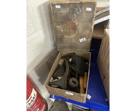 Hand tools and a metal shoe lasts