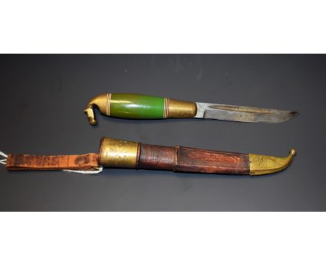 A Middle Eastern dagger, 9.5cm blade, horse head pommel, brass mounted leather scabbard, 22cm long