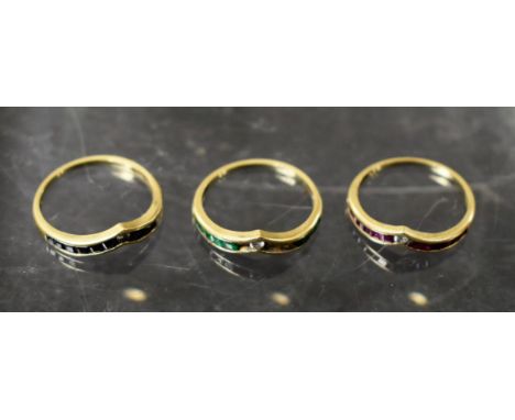 Rings - a set of three diamond, ruby, emerald or sapphire V band rings, each wearable individually or together, all 14ct gold