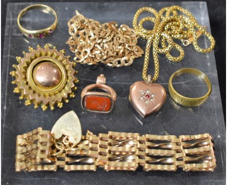 A 9ct gold gate link bracelet; a 9ct gold necklace; a gold metal target brooch; a 9ct gold ring; a seal fob; approx 34g, etc