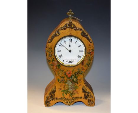 A balloon shape mantel timepiece, gilt metal mounted, the case printed with floral sprays, white enamel dial, Roman numerals,