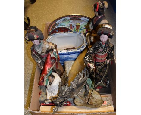 A Chinese Geisha doll with ceramic head, 40cm high; others similar; a cast metal bowl modelled as a dragon; blue and white Or