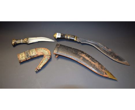 An Islamic dagger; a kukri (2)