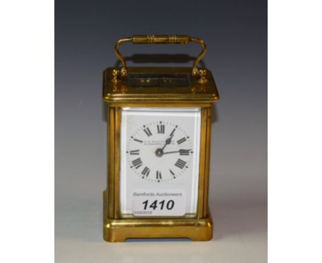 An early 20th century lacquered brass carriage timepiece, the enamel dial inscribed Wm. Burford & Son, Eastbourne & Exeter, c