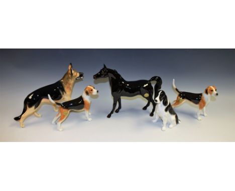 A Beswick ceramic model, German Shepherd JBCOD5, boxed; others, English Springer Spaniel Black/White JBD52, Foxhound JBD71, A