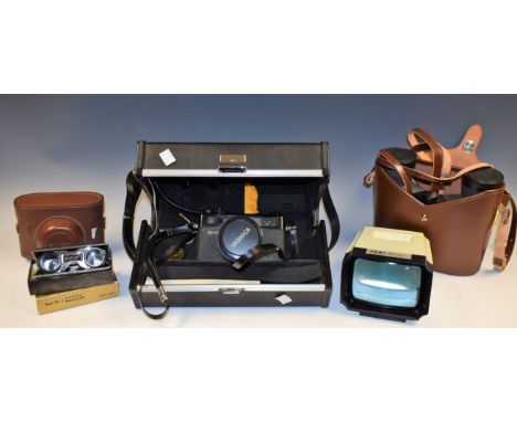 Optical Equipment - a pair of Swift Audubon H.R. binoculars, 8.5 x 44, cased; a Yashica Electro 35 camera, cased; others, Gol