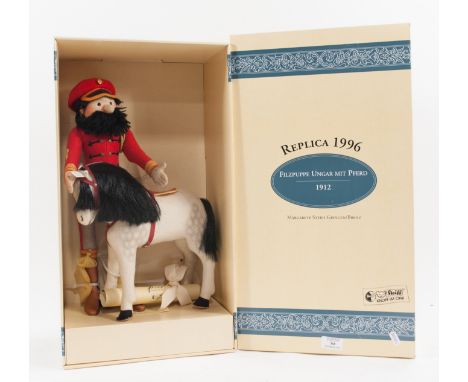 Modern Steiff felt doll Hungarian with horse; 1912 replica 25cm tall, with box and certificate limited edition of 1200.
