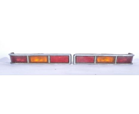 Pair of rear indicator lights for a Vauxhall Viva motor car, original, but not tested.