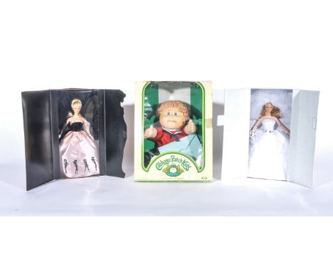 Boxed Cabbage Patch Kids doll, with two other boxed 1990s Barbie Dolls (3).