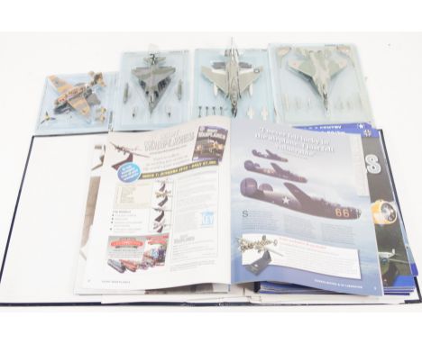 Diecast model aircraft; mostly 1:100 scale all sealed in blister packs with folder of related magazine, one box, (33).