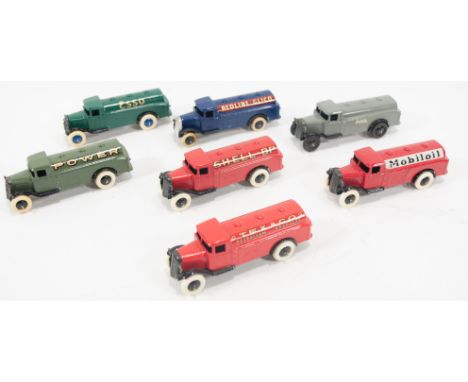 Seven pre-war Dinky Toys, model 25d petrol tankers, all re-casted or restored, to include decals; Texaco, Mobiloil, Shell-BP,