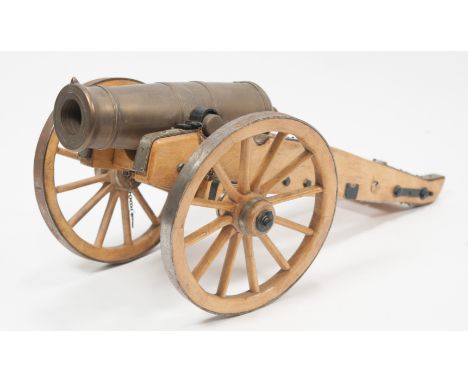 Scale model of a Canon, with brass gun, wooden frame, 41cm.