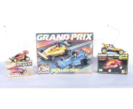 Scalextric and Matchbox racing sets, with two radio control buggies.