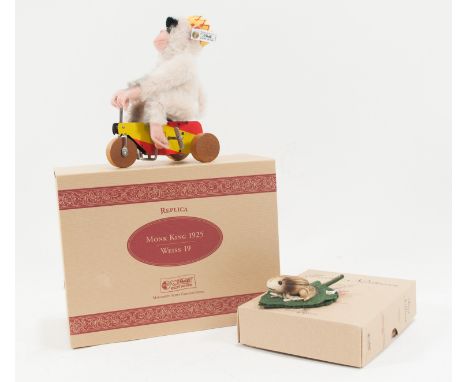 Modern Steiff Monkey King on tricycle; replica 1925, with box and certificate limited edition of 1200, along with a frog on p