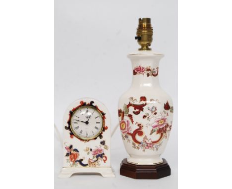 A Masons china mantel clock in the Mandalay pattern together with a Masons Staffordshire ceramic table lamp. H32 cm (lamp). 