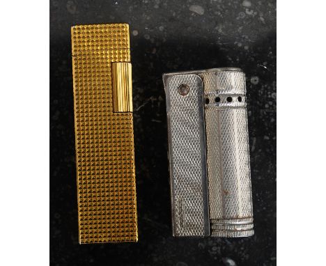 Two vintage cigarette lighters to include a Polo Imco Triplex Junior Austrian lighter, and a Calibri gold plated lighter. 