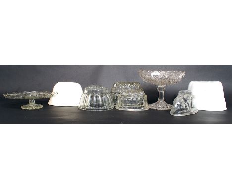 A mixed collection of vintage glassware and ceramics to include 6x vintage jelly moulds (four glass, two ceramic) and two vin
