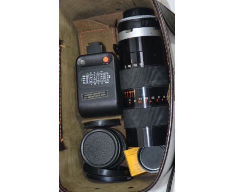 A cased vintage 35mm Chinon camera with several lenses, flash head and other accessories.

UK, European & Worldwide packaging