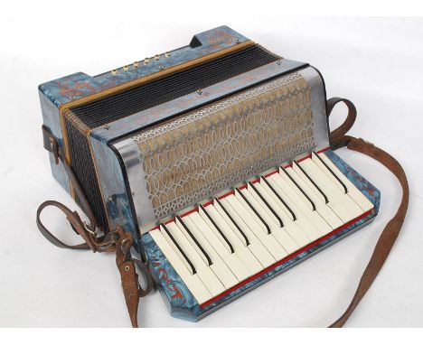 A vintage 1950's Pictro accordion complete in the original case. The instrument with good faux marble blue finish and decals